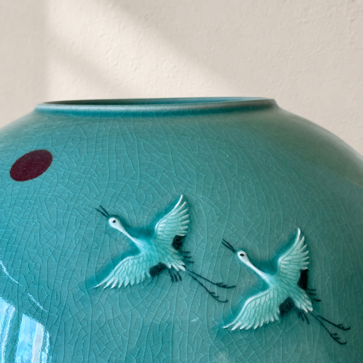 Celadon Vessel: Paired Cranes in Raised Relief with Red Sun, 2024