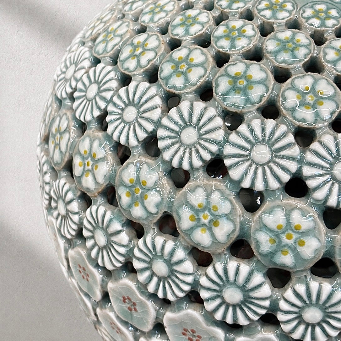 Celadon Triple-Walled Openwork Vase: Blossoming Motifs