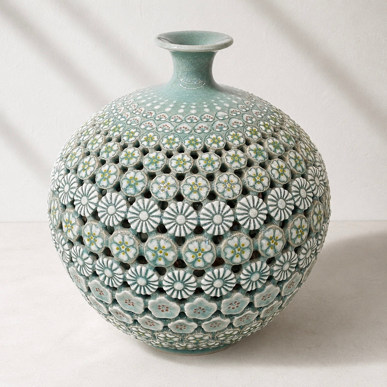 Celadon Triple-Walled Openwork Vase: Blossoming Motifs